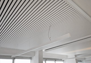 Sistema radiante soffitto metallico Eurotherm SAPP edificio Corso Italia 13, Milano