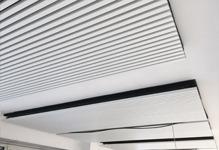 Sistema radiante soffitto metallico Eurotherm SAPP edificio Corso Italia 13, Milano